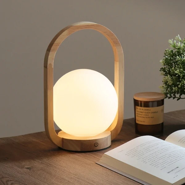 https://forlightsleepers.com/wp-content/uploads/2022/03/Orb-%E2%80%93-Portable-Wooden-LED-Lantern-5-1.webp