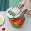 All-in-1 Slicer, Strainer And Container
